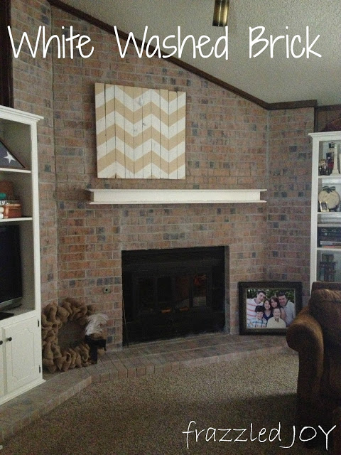 white washed brick fireplace surround