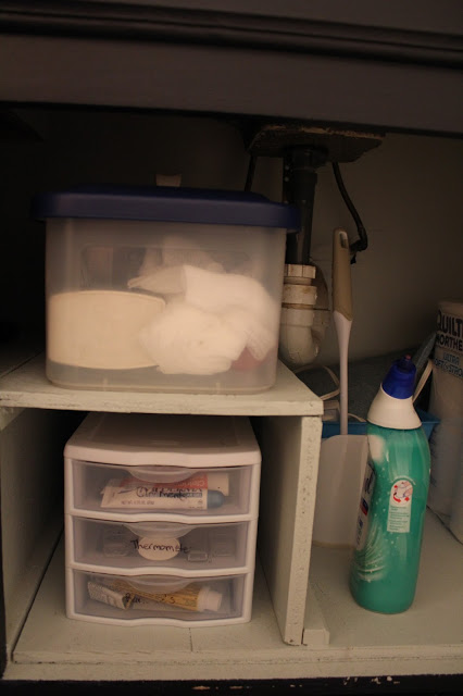 Under sink organization for the bathroom.