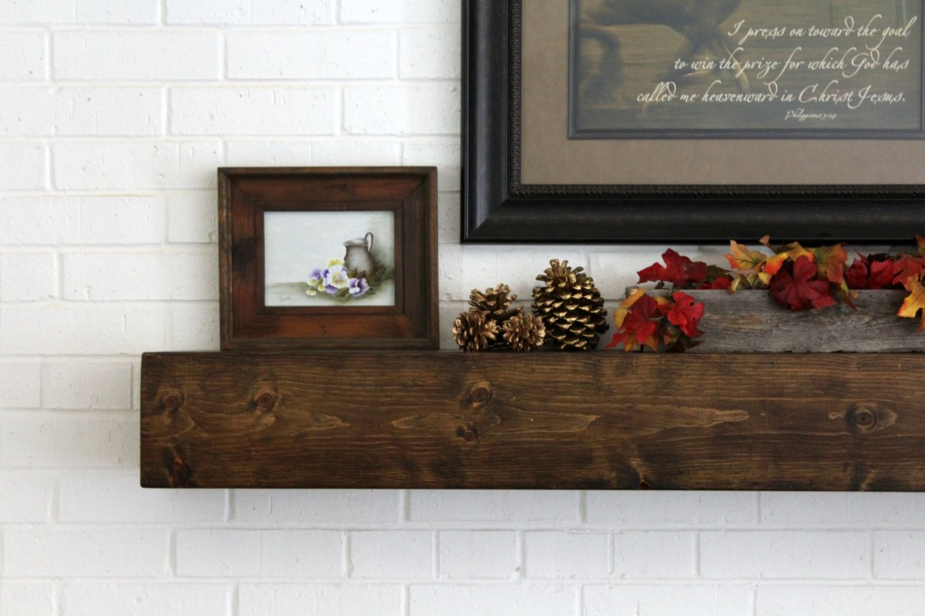 gold-pine-cones-on-mantel