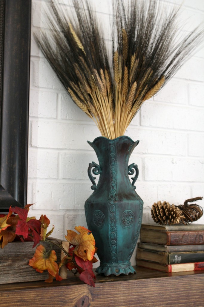 torquoise-vase-with-wheat-on-mantel