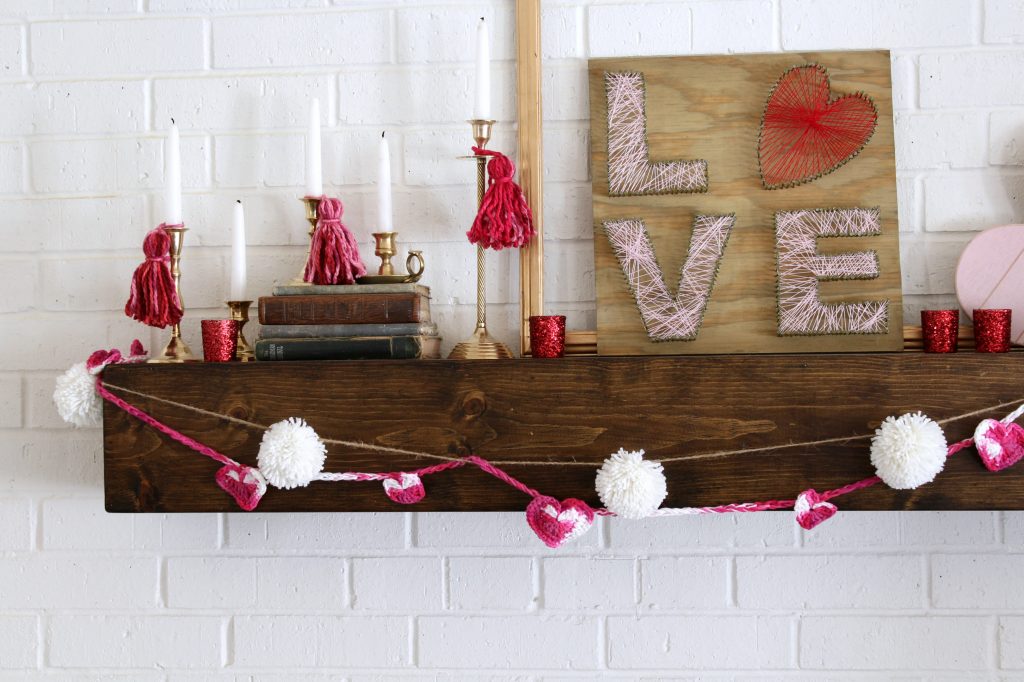 Tassels on the brass candlesticks dresses them up for Valentine's Day.
