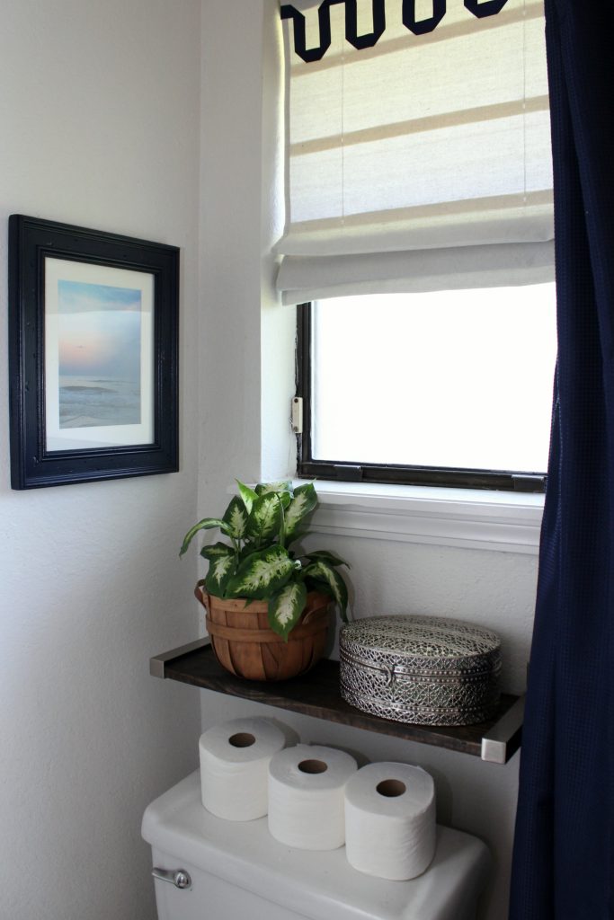 Navy and white master bathroom