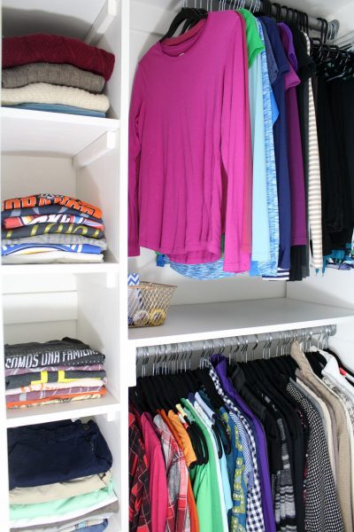 DIY shelves for folded storage in a walk-in closet