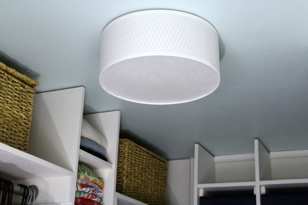 light blue ceiling and ikea light fixture for closet