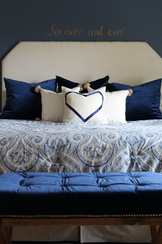 cozy navy and neutral bedding