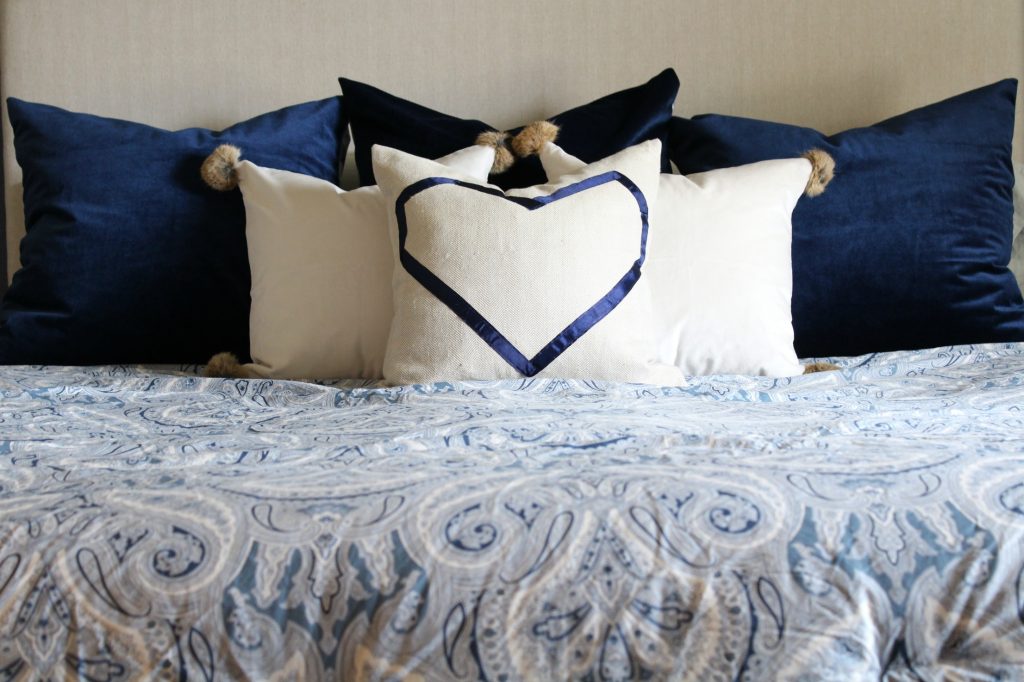 navy and neutral throw pillows