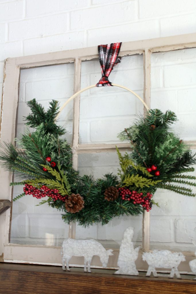 Christmas hoop wreath  hung on old window