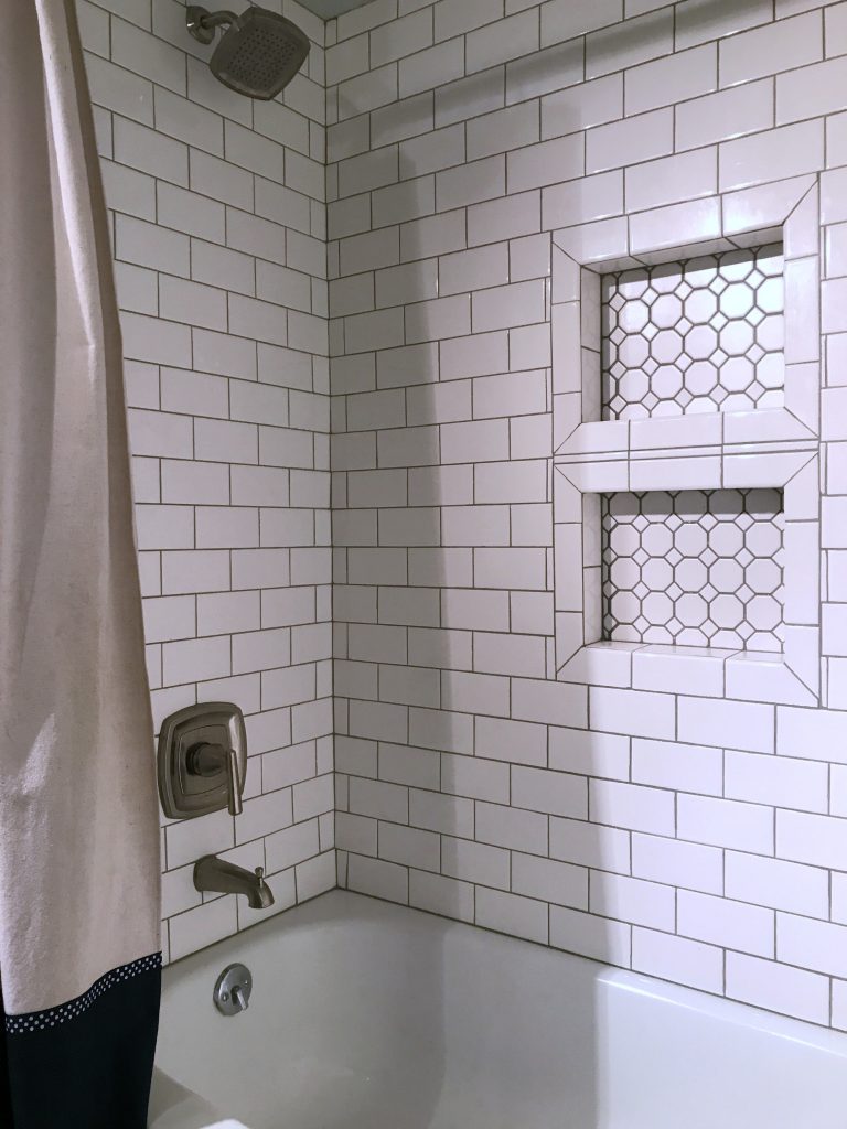 New shower tile and fixtures