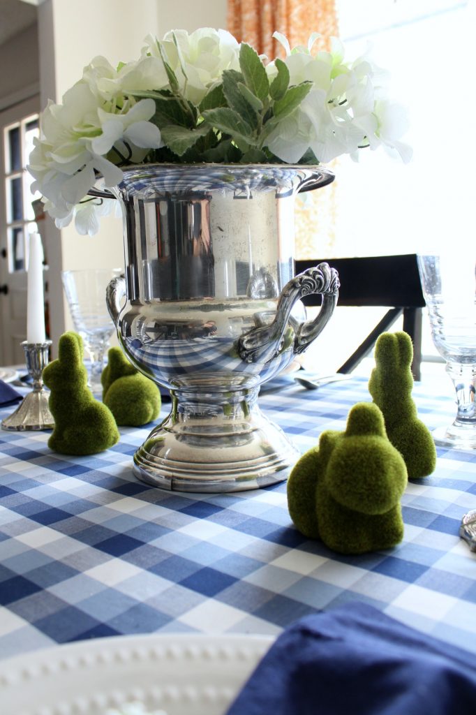 An vintage trophy vase makes a great centerpiece.