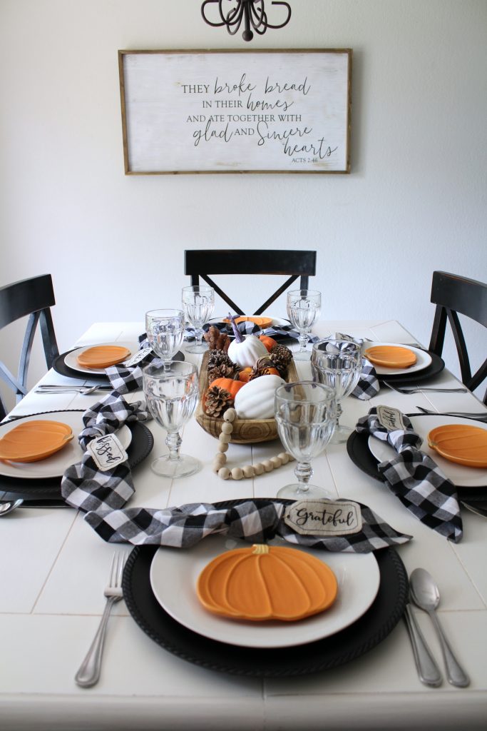 Pumpkin and gingham fall tablescape