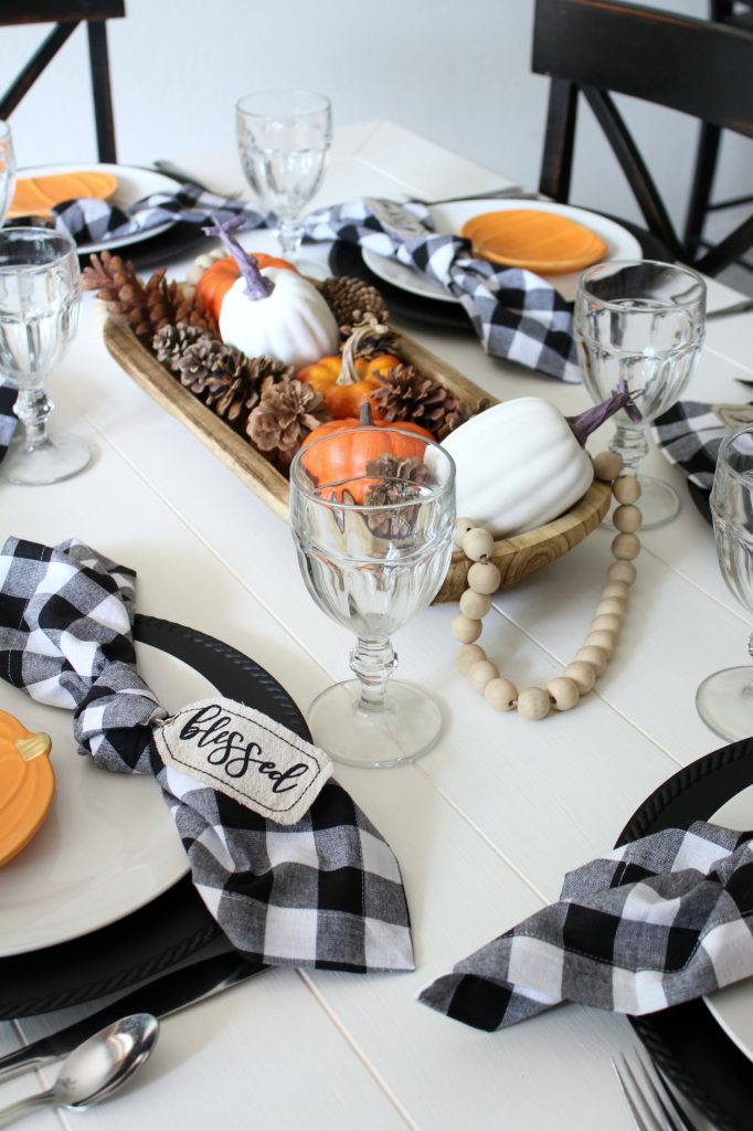 Pumpkin and gingham fall tablescape