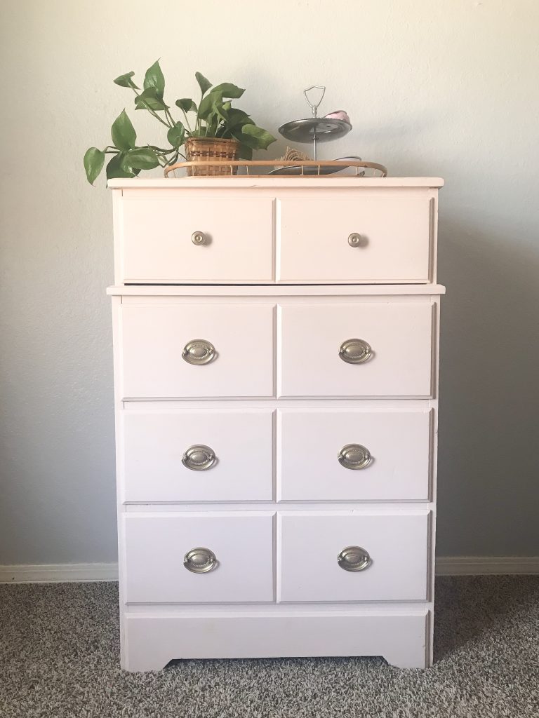 Painted dresser with refurbished hardware