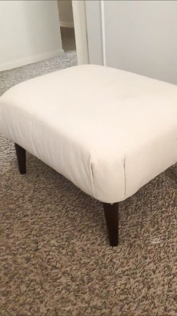 Ottoman reupholstered with dropcloth canvas