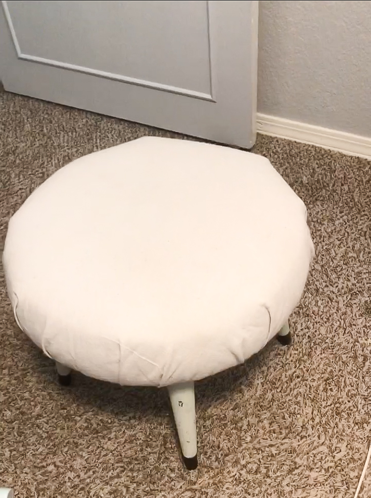 Ottoman reupholstered with dropcloth canvas