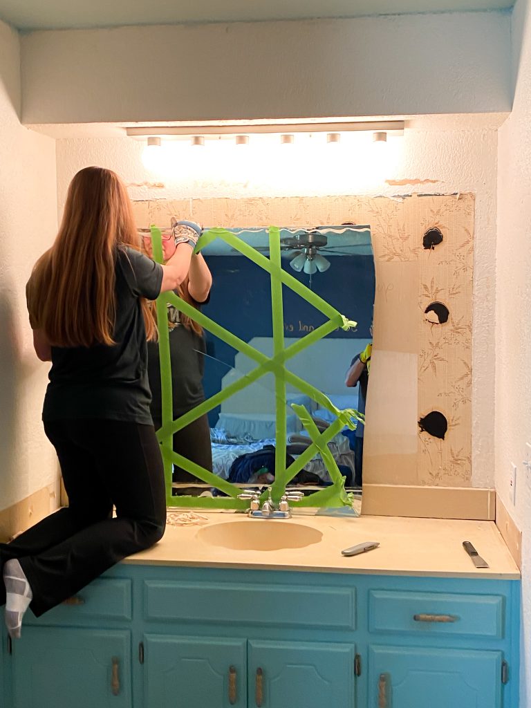 Removing a large wall mirror