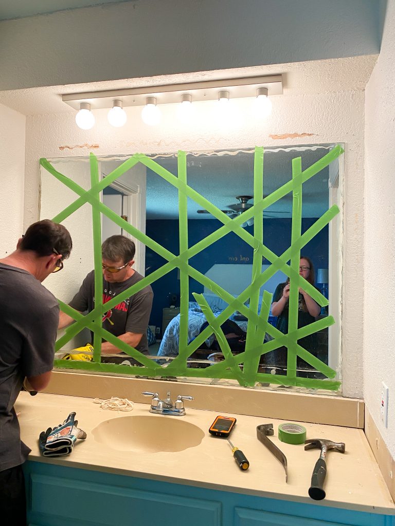 Removing a large wall mirror