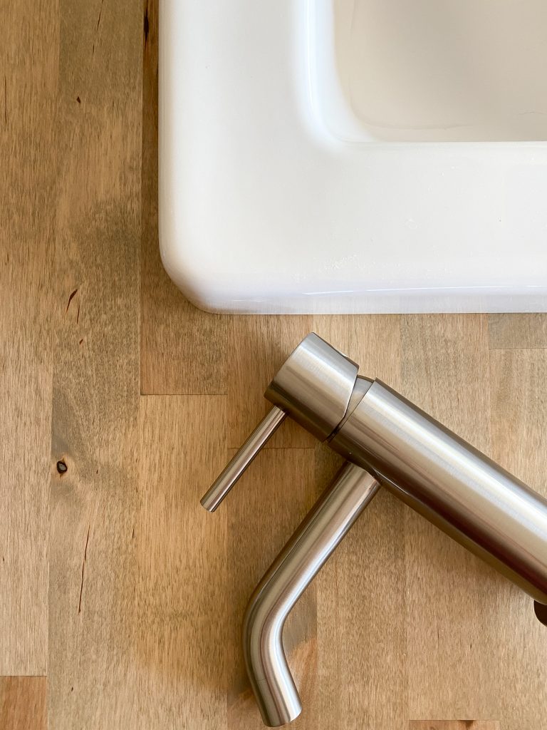 Cabinet, sink and faucet detail