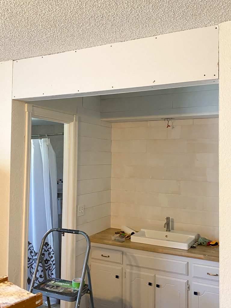 Drywall on barn door header