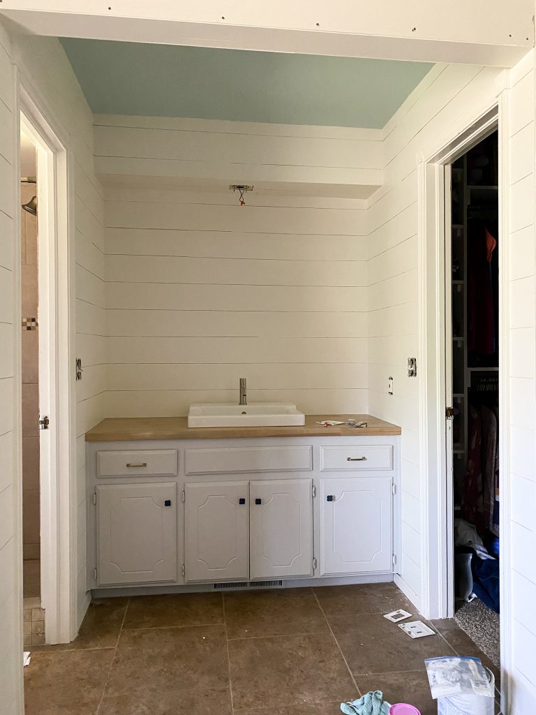 Painted shiplap in master bathroom update